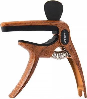 Produktbild von DigiRigi® Kapodaster 3‑in‑1 – Kapodaster mit Plektrumhalter & Brückennagelzieher, für Akustik-, E‑Gitarre, Bass, Ukulele, Banjo, Mandoline, Zinklegierung, Holzmaserung