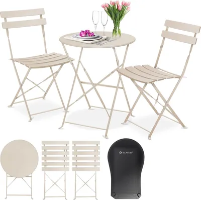 A beige metal bistro set with two chairs and a table, along with a black cover, displayed on a white background.