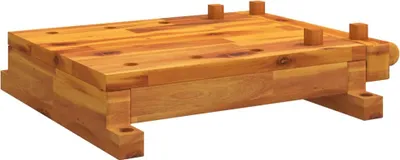 A wooden workbench top with four wooden pegs on top, shown from a 3/4 angle on a white background.