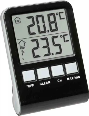 A digital thermometer with an LCD screen showing indoor and outdoor temperature readings.