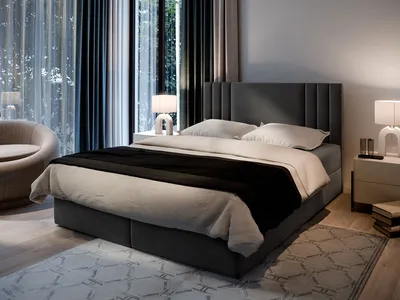 A bedroom scene with a bed, nightstand, and chair.