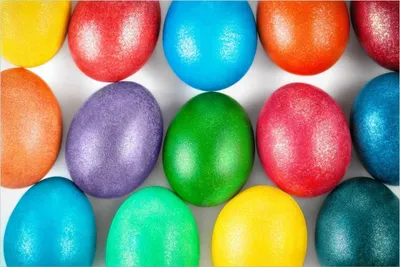 Produktbild von Wallario Premium Glasbild, freischwebende Optik, kräftige Farben, Größe 90 x 60 cm Motiv Bunte Oster-Eier in Nahaufnahme mit kräftigen Farben