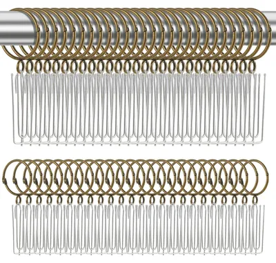 Imagen del producto de 80 anillas metálicas para cortinas, color bronce antiguo, con un diámetro interior de 38 mm
