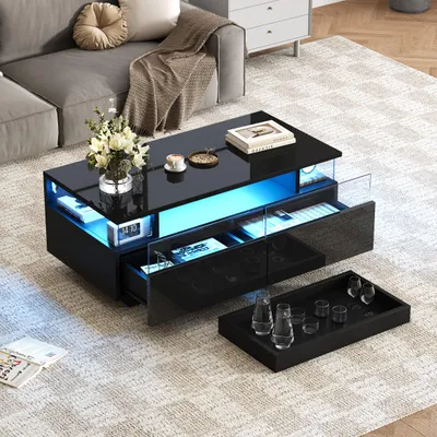 A modern living room scene with a black coffee table with LED lighting, a gray sofa, and a rug.