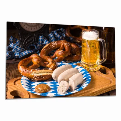 Produktbild von Wallario Herdabdeckplatte aus Glas, Größe 90 x 52 cm 1-teilig, Motiv Bayerische Brotzeit mit Weißwurst, Brezel und Bier