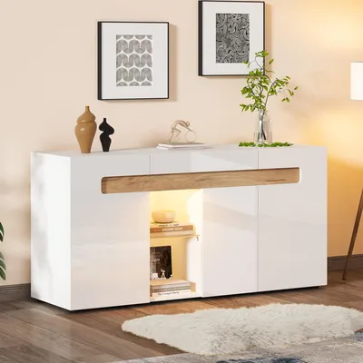 A modern white and wood-effect sideboard with internal lighting, displayed in a room setting with artwork on the wall and a rug on the floor.