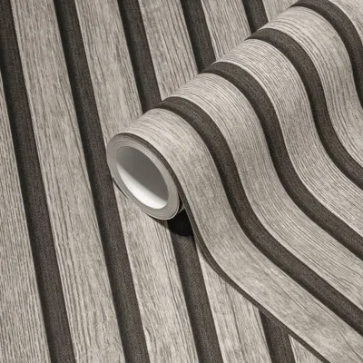 A roll of wallpaper with a wood panel design.