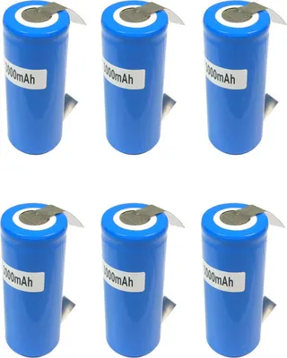 Six blue cylindrical batteries are arranged in two rows of three against a white background.