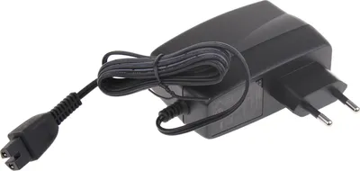 A black power adapter with a coiled cord and a European plug.