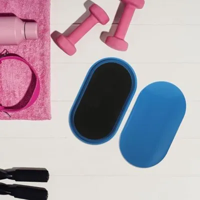 Produktbild von 2 ovale Fitness-Gleitscheiben für das Ganzkörper-Workout und Pilates-Training zu Hause mit rutschfester Oberfläche