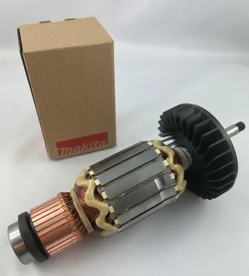 A new Makita armature rotor with its original packaging box.