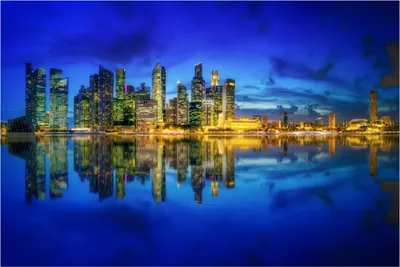 Produktbild von Wallario Poster - Skyline von Singapur in der Abenddämmerung, Kunstdruck Größe: 61 x 91,50 cm