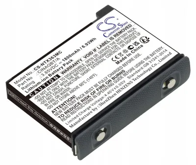 A close-up, angled view of a black and gray lithium-ion battery pack with a white label containing product information and warnings.