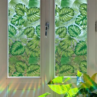 Productafbeelding van Unyqoos® raamfolie – zelfklevend, effect van gekleurd glas met regenboogkleuren, privacybescherming, groen, 40 x 1016 cm