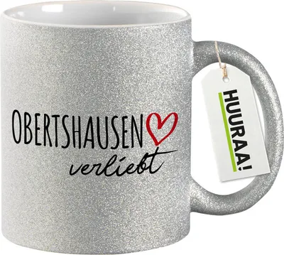 Produktbild von Huuraa Glitzertasse Obertshausen verliebt 330ml Silber Keramik Kaffeebecher Geschenkidee
