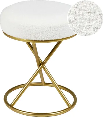 A white bouclé stool with a gold metal base.