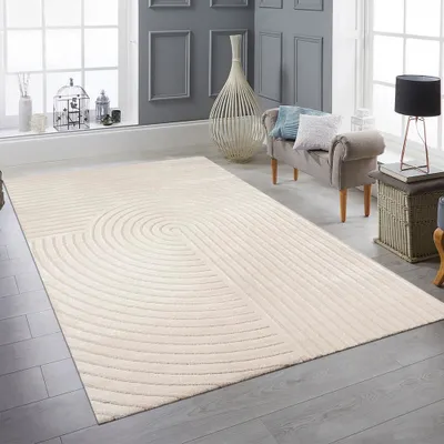 Zdjęcie produktu dla Nowoczesny dywan z motywem kokardy w kolorze beżowym Rozmiar - 140 x 200 cm