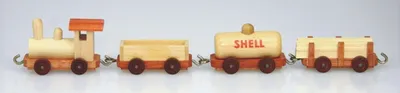Immagine prodotto di Giocattolo in legno, trenino con 3 vagoni, modello "treno merci" naturale, dimensioni 26x3,5 cm, nuovo