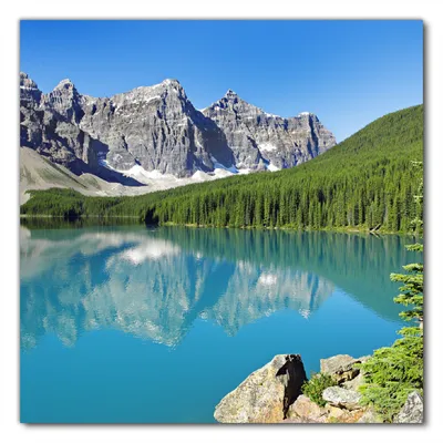 Produktbild von Wallario selbstklebende Möbelfolie/ Tischdecke für Innen und Außen, Größe: 100 x 100 cm - Tiefblauer See mit Bergpanorama und Wäldern  Kanada