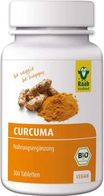 A white bottle of Raab Vitalfood Curcuma tablets with an illustration of turmeric roots and powder on the label.