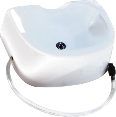A white plastic hair washing basin with a drain and a flexible tube attached.