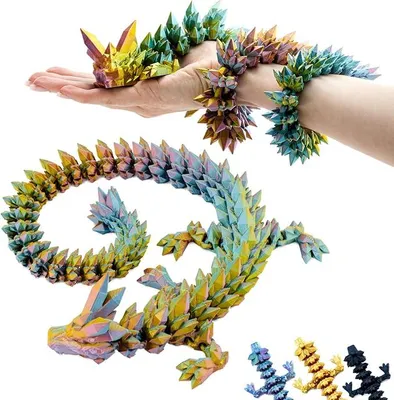 A person's hand and arm are holding and wearing a colorful, crystal-like dragon figurine.