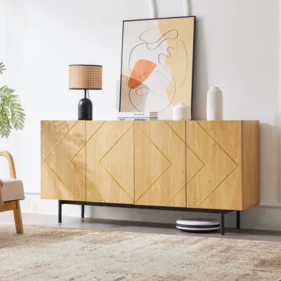 A modern living room scene featuring a wooden sideboard with diamond pattern doors, a lamp, artwork, and decorative vases.