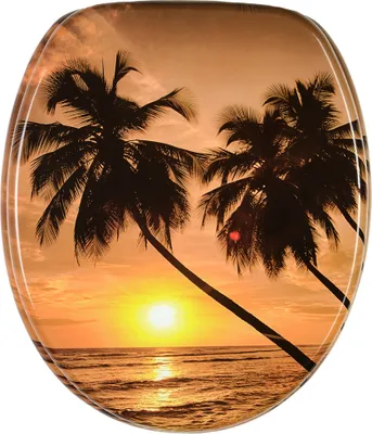 A toilet seat with a tropical sunset scene featuring palm trees and the ocean.