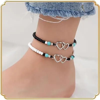 Imagen del producto de Dos tobilleras, con cuentas turquesas, diseño de corazón, ideales para el verano y la playa