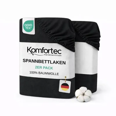 A product shot of two black fitted sheets packaged together, with a cotton boll for decoration.