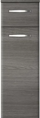 A front view of a tall, narrow cabinet with two drawers at the top and a larger cabinet door below. The cabinet has a wood grain texture in a graphite color and features sleek, horizontal silver handles.
