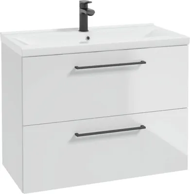 A white bathroom vanity with a sink and faucet.