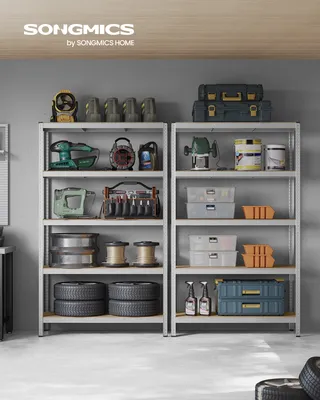 Two metal shelving units filled with various tools and storage containers in a garage or workshop setting.