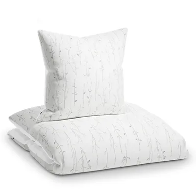 A stack of bedding with a floral pattern.