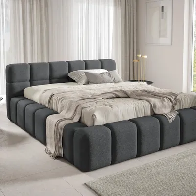 A bedroom with a bed.