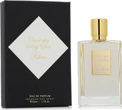 A perfume bottle and its packaging are displayed side-by-side on a white background.