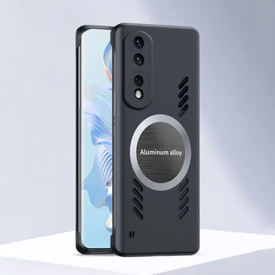 A black phone case with a silver aluminum alloy circle on the back, next to a smartphone.