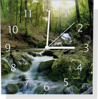 Produktbild von Wallario Design Wanduhr Fließender Bach im Wald bei Sonnenuntergang aus Aluverbund, Größe 30 x 30 cm