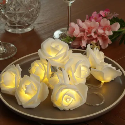 Produktbild von LED Lichterkette Rosen - 10 leuchtende Rosen - Timer - Batteriebetrieb - L: 1,8m - für Innen - weiß