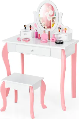 A child's vanity table and stool set with toy makeup.