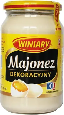 A jar of mayonnaise on a white background.