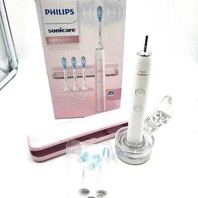 Produktbild von Philips Sonicare DiamondClean DiamondClean 9000 HX9911/79 Wiederaufladbare Zahnbürste, Erwachsener, Schallzahnbürste, Zahnfleischpflege, Whitening, Pink, Weiß, Ergonomisch, iPad 3rd Gen or higher; iPhone 4S or higher; with iOS7 or higher; with iOS 7 operating system ;...