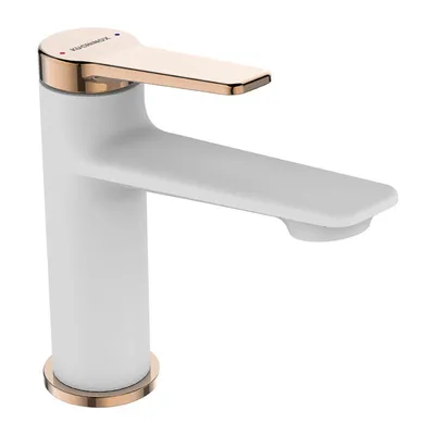 A white and rose gold faucet against a white background.