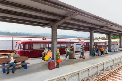 Produktbild von NOCH handkolorierter Deko-Adventskalender mit 24 Figuren für Spur H0 Modelleisenbahn, detailreiches Modellbahn-Zubehör.