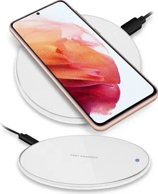 Two white wireless chargers are shown, one with a smartphone on it, against a white background.