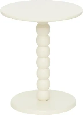 A white side table with a round top and a base, connected by a stem made of stacked spheres.