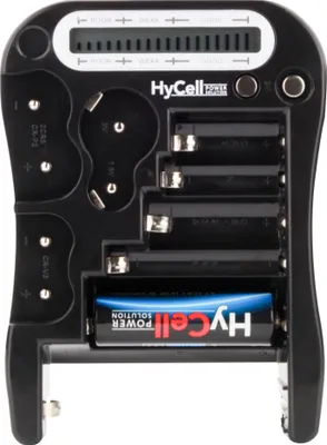 A black digital battery tester with various battery slots and a display screen.