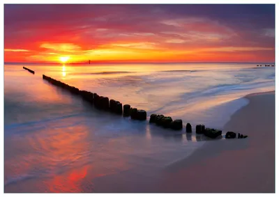 Produktbild von Wallario Premium Glasbild, freischwebende Optik, kräftige Farben, Größe 100 x 70 cm Motiv Farbenspiel im Himmel - Sonnenuntergang am Strand