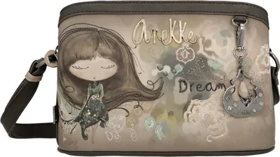 A close-up studio shot of a crossbody bag with an artistic design.