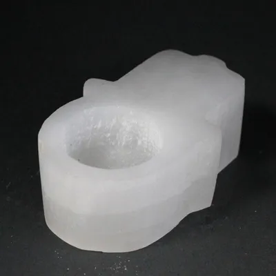 Immagine prodotto di Candelabro in selenite con hamsa